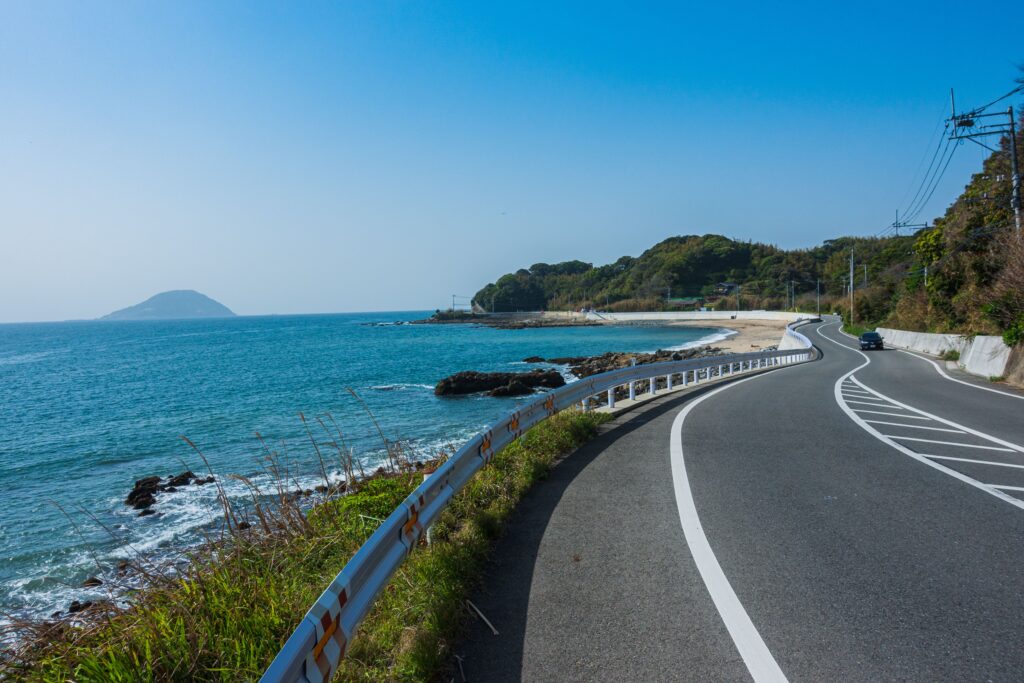 Best Places to Visit in Japan in 2026: 25 Amazing Must-See Gems Discover the stunning seaside road along Fukuoka's picturesque coastline, ideal for travel enthusiasts.